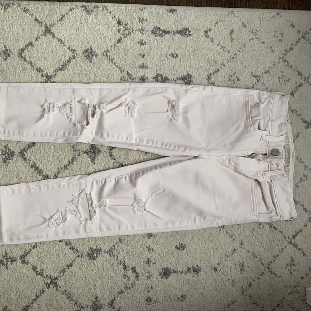 light pink ripped jeans